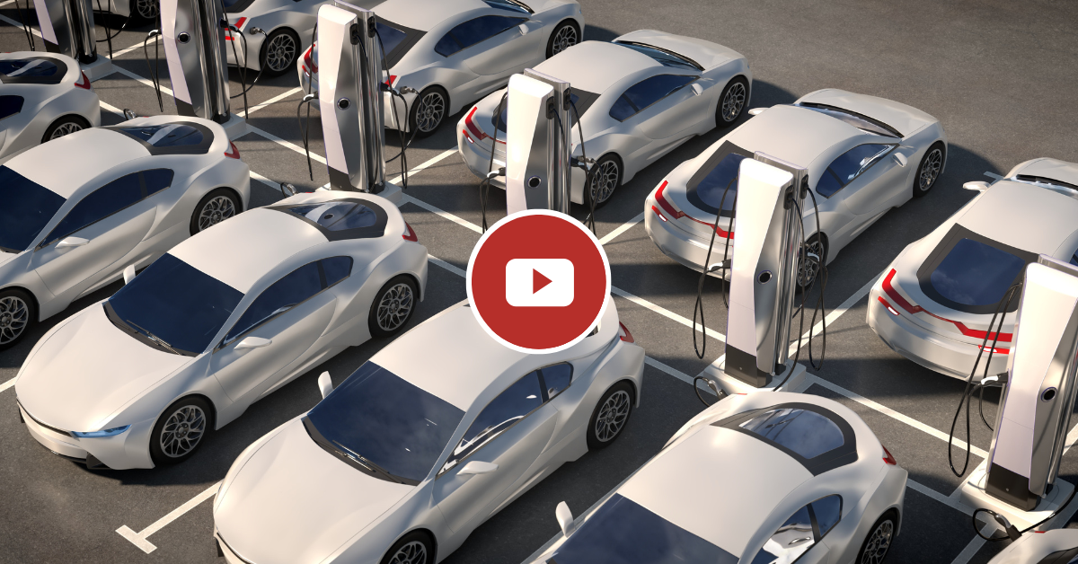 Image of Electric Vehicles lined up at charging stations with Video Icon overlaid